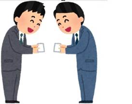 名刺交換するスーツの男性